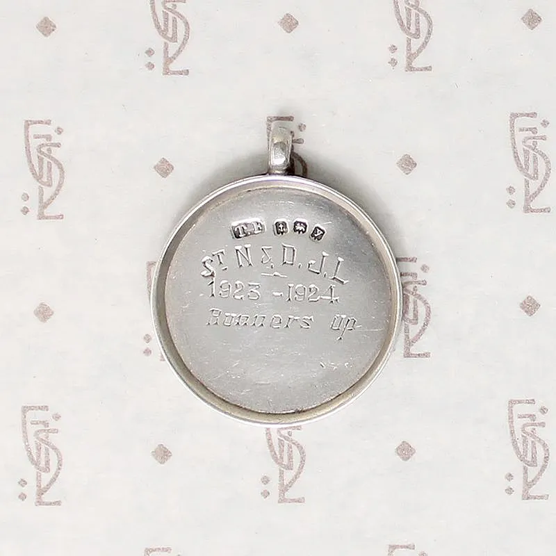 Elegant Sterling Medal Fob with Gold Shield